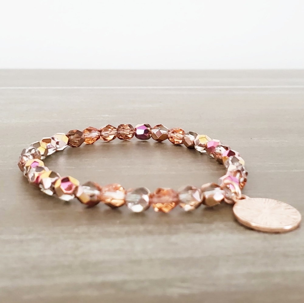 Rose gold beaded stretch bracelet with rose gold c